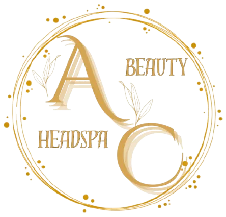A Beauty Headspa : Logo Doré pour Soin Capillaire de Luxe Logo doré A Beauty Headspa avec lettre A stylisée, feuilles et cercle pétillant élégant.